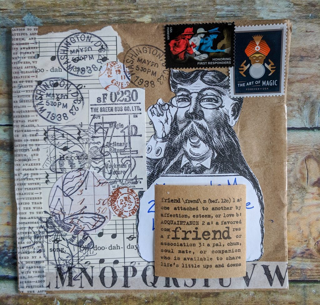 an envelope collaged with papers and stamps