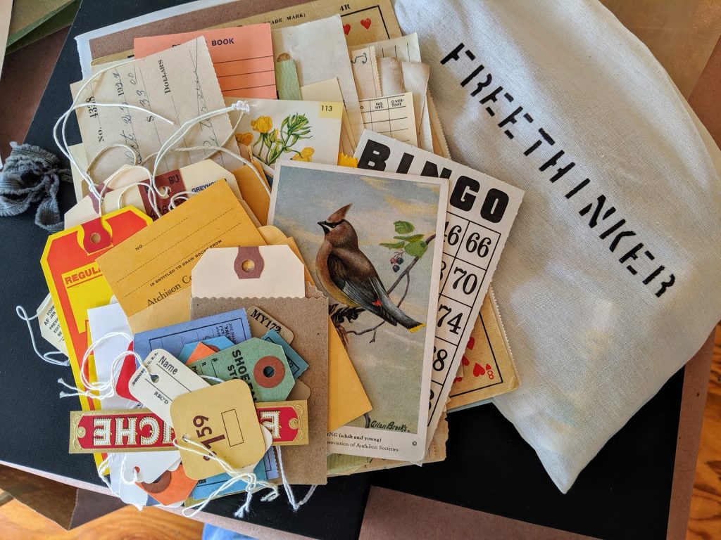 A cloth bag was filled with paper vintage ephemera