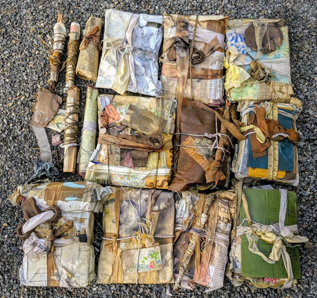 a group of tea bathed papers lay side by side