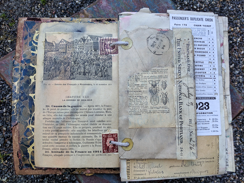 a small collage on the back of an old envelope