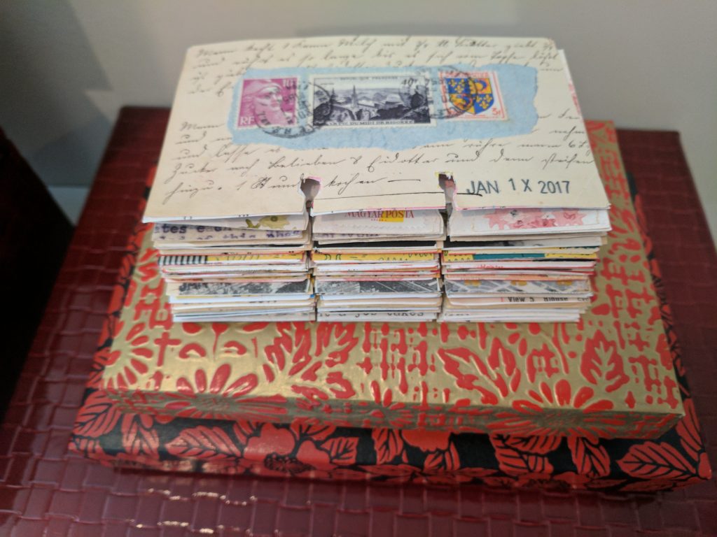 a stack of rolodex art cards